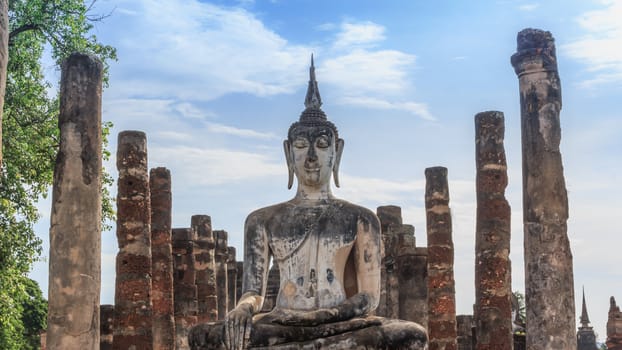 Buddha Statue at Temple in Sukhothai Historical park , Thailand