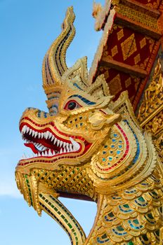 golden serpent statue head