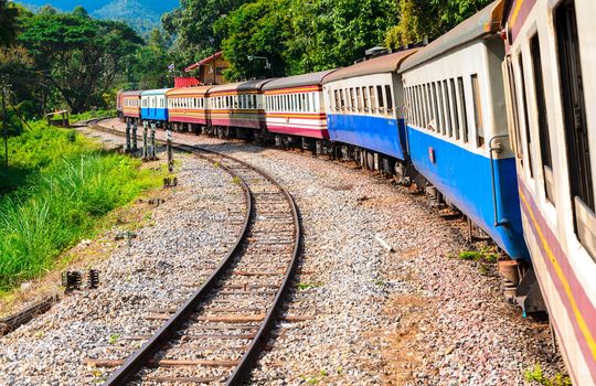 train with curve of railway track