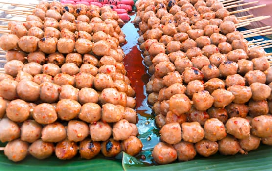 closeup of grilled meatballs in market