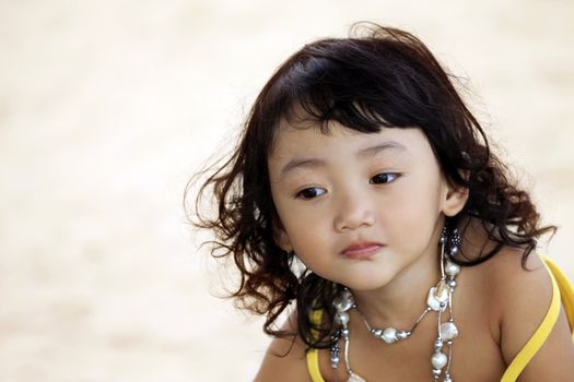 Portrait of the beautiful small Asian girl.  Indonesia. Java