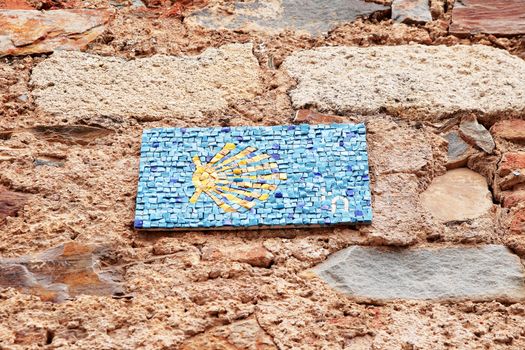 santiago signal path wall tiles made ​​of the monumental city of Cáceres in Extremadura Spain