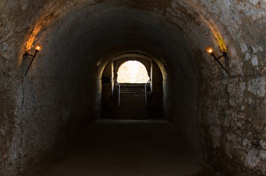 bad lit catacombs of the castle in Dubno, Ukraine