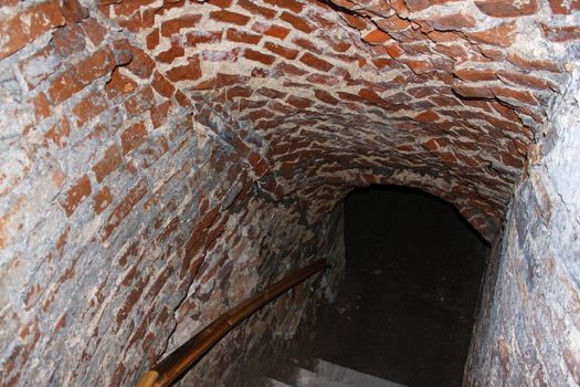 Well lit catacombs of the castle in Dubno, Ukraine