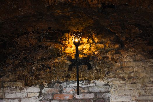 torch on the wall of an old castle  Dubno, Ukraine