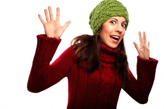 Attractive young caucasian woman in red sweater on white background