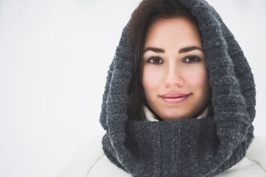 Portrait of beautiful young girl in winter day