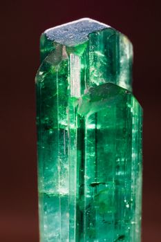 Rare rough unpolished green turmaline gemstone. Found in Pakistan. Birthstone for October.