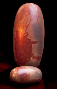 Tantric Lingam stone, Cosmic Eggs, from Narmada River in India are one of the oldest religious symbols of human civilization. They are naturally tumbled and pre-shaped by the river.