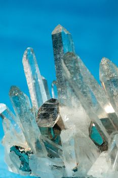 Big quartz crystals (rock crystal) with iron pyrite (fool's gold) crystals grown on.