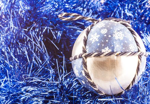 Italy. Traditional handmade Christmas balls made of white and blue fabric