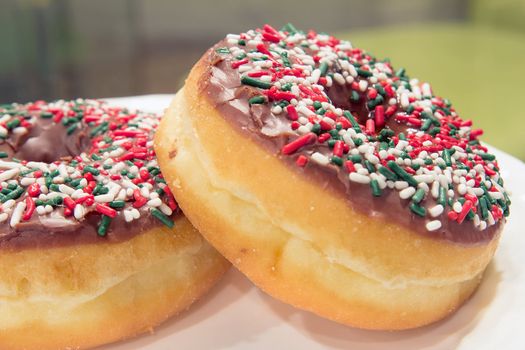 Donuts with Christmas Red Green and White Sprinkles Closeup