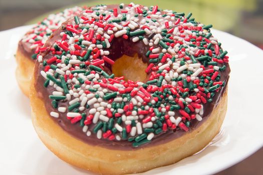 Doughnuts with Christmas Red Green and White Sprinkles Front Closeup
