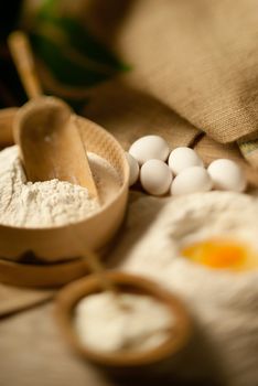 Full baking utensils on a table in defocus