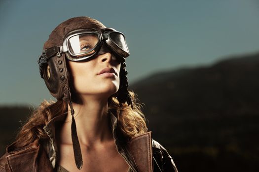 Portrait of young woman airplane pilot