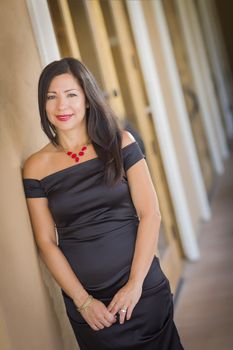 Attractive Smiling Hispanic Woman Portrait Outside.