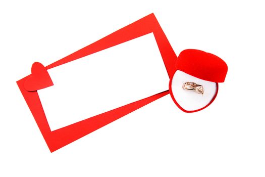 Blank valentine card with copyspace to write your own text and a gold ring in a box