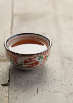 Cup of tea on wood board, drink for health