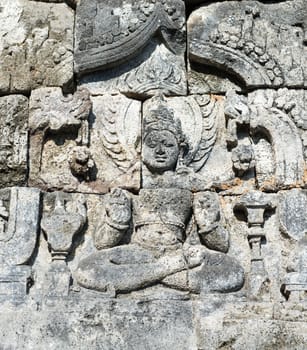 Images of Buddha on wall of temple in Candi Sewu complex (means 1000 temples). It has 253 building structures (8th Century) and it is the second largest Buddhist temple in Java, Indonesia.