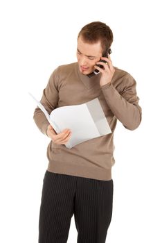 Handsome young manager with document folder calling by the phone isolated on white background