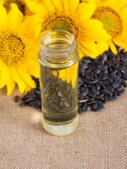 sunflower seeds and vegetable oil in a bottle 