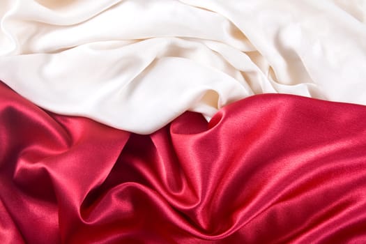 red and white background with a red and white satin
