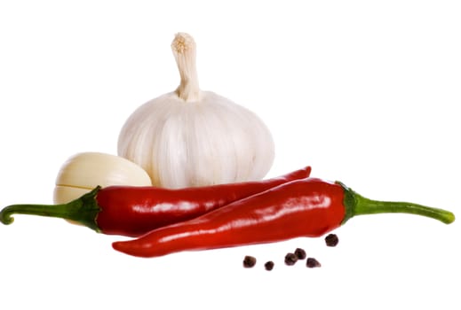 still life of garlic pepper and spice isolated on white background