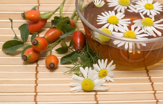 Tea made from chamomile and rose hips. alternative Medicine