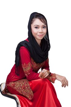 Beautiful muslim lady wear red with hijab, henna painted on hand