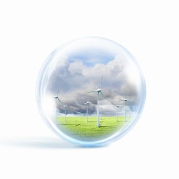 A group of wind turbines or windmills inside a glass sphere