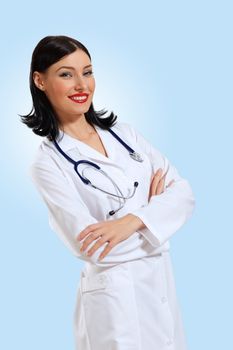 Portrait of happy successful young female doctor holding a stethoscope