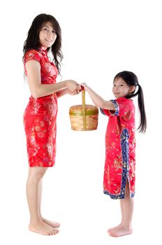 Full body oriental family in chinese red cheongsam dress, celebrating Chinese new year, isolated on white background