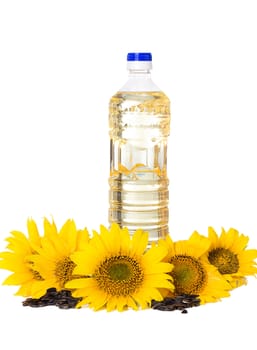 Bottle of sunflower oil with flower isolated on white background