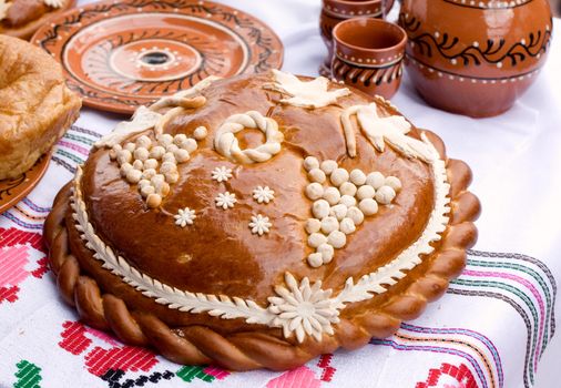 Traditional Moldovan loaf. Bread for the embroidered tablecloth
