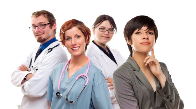 Young Mixed Race Woman with Doctors and Nurses Behind Isolated on a White Background.