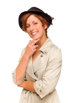 Attractive Red Haired Girl Wearing a Trenchcoat and Hat Isolated on a White Background.