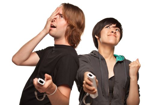 Fun Happy Mixed Race Couple Playing Video Game Remotes Isolated on a White Background.