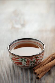 Cup of tea on wood board, drink for health