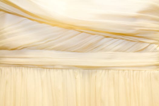 A detail image of a wedding dress before the marriage ceremony.