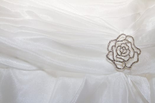 A detail image of a wedding dress before the marriage ceremony.