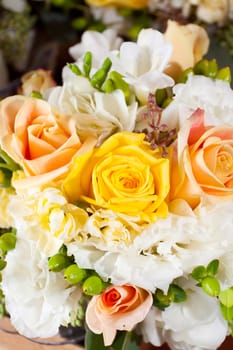 Close-up detail image of wedding flowers ina bouquet at a ceremony.