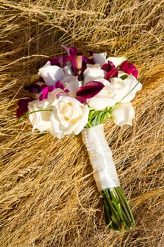 A bride's wedding bouquet looking beautiful at her wedding ceremony and reception.