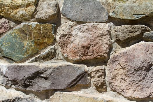 An abstract image detail of a stone wall.