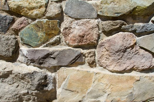 An abstract image detail of a stone wall.