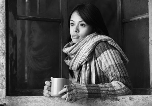 Portrait of a beautiful woman  with a cup of coffee or tea