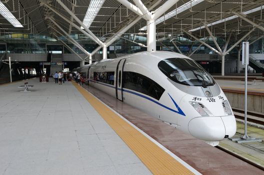 SHENZHEN, CHINA - SEPTEMBER 9:  Fast train starts from Shenzhen to Wuhan on September 9, 2012. With speed 300km/h train arrives Wuhan within 5 hours.