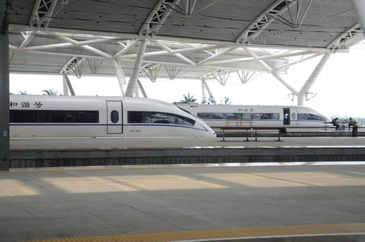 GUANGHZOU, CHINA - SEPTEMBER 9:  Fast train between Shenzhen and Wuhan stops in Guangzhou railway station on September 9, 2012. 