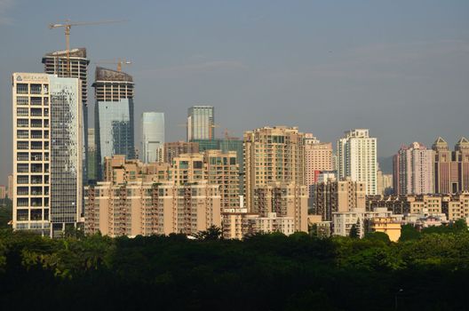 SHENZHEN, CHINA - SEPTEMBER 14:  Modern Shenzhen city, Futian district with new and old residential buildings on September 14, 2012. Within 30 years Shenzhen became modern business metropolis.