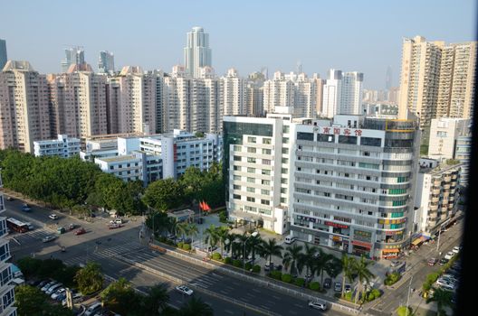 SHENZHEN, CHINA - SEPTEMBER 16:  Modern Shenzhen city, Futian district. Cityscape with hotels, school and hospital on September 16, 2012. 