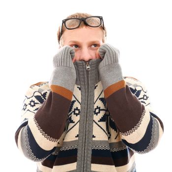 Young man in sweater feel cold over a white background